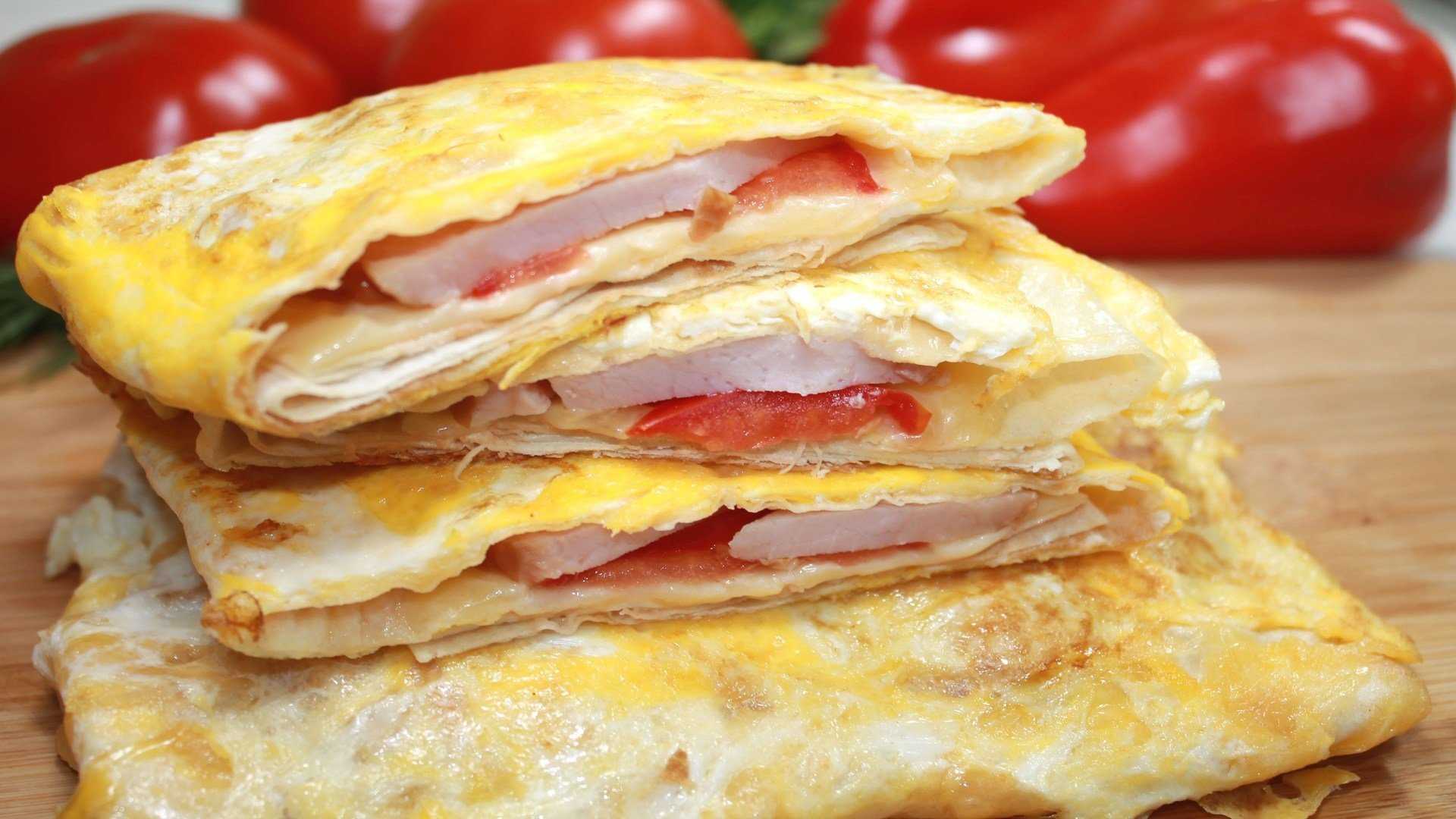 Конвертики из лаваша с сыром и яйцом: рецепт с фото