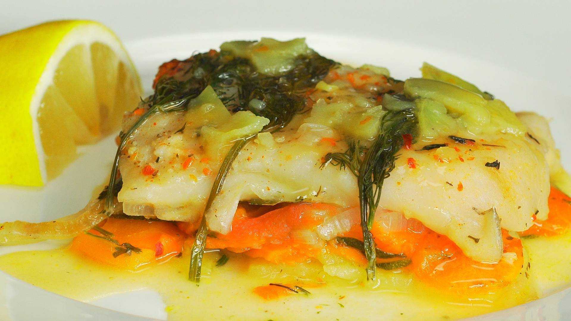 Минтай в духовке — 8 самых вкусных рецептов запечённой рыбы