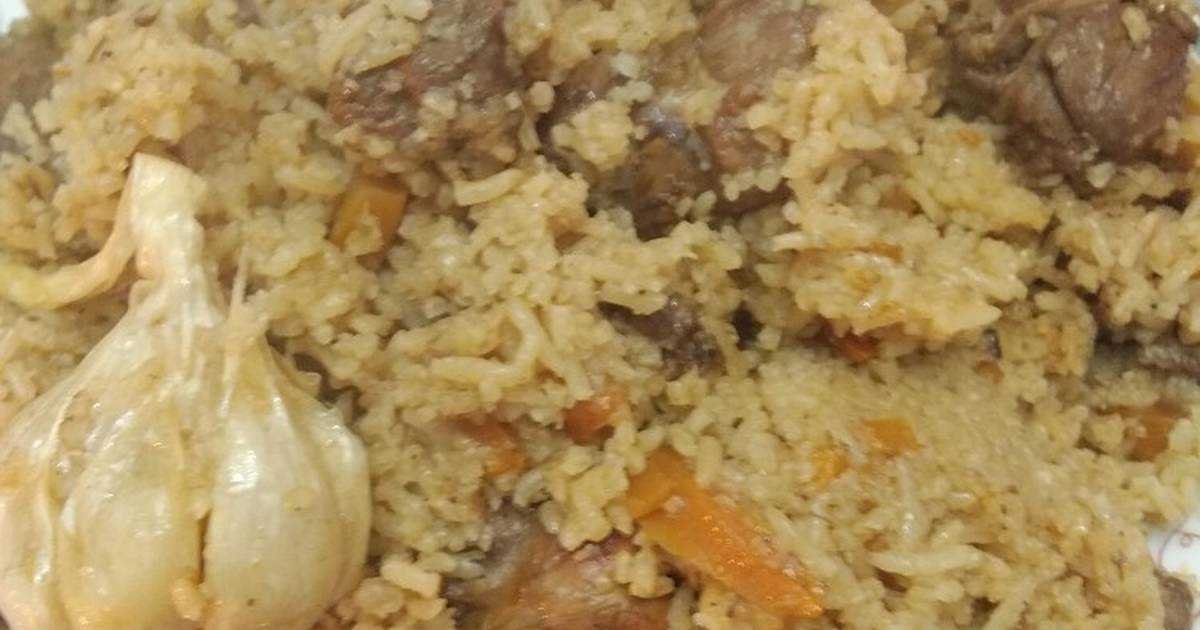 Вкусный плов из утки с добавлением чеснока и пряностей